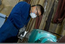 Polishing Metal In Workshop Royalty Free Stock Photography Polishing Metal In Workshop Royalty Free Stock Photography