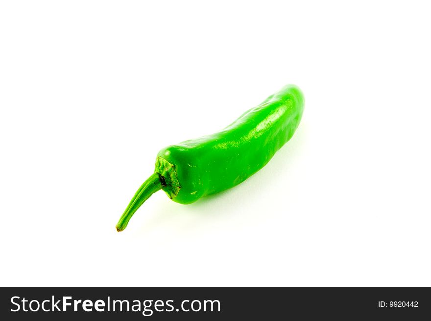 Single green chile with clipping path on a white background