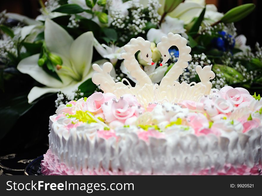 Wedding pie with figures of two swans.