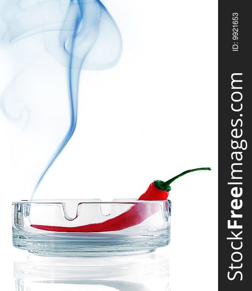 Burning chili pepper with smoke