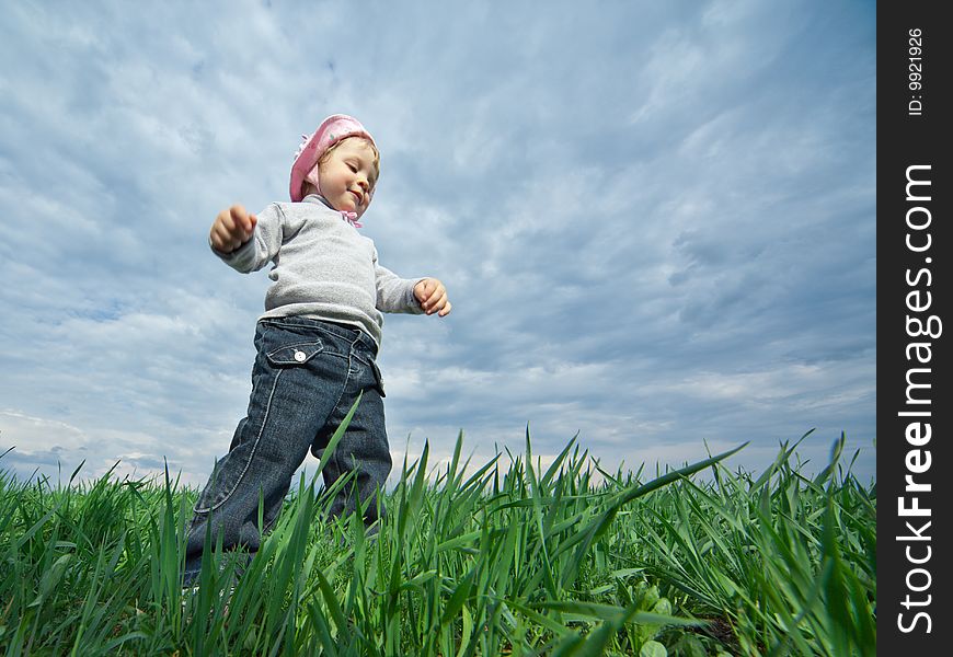 Little girl in field