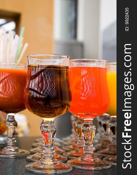 Colorful fruit juices photographed in buffet of opera. Flash not used. Colorful fruit juices photographed in buffet of opera. Flash not used.