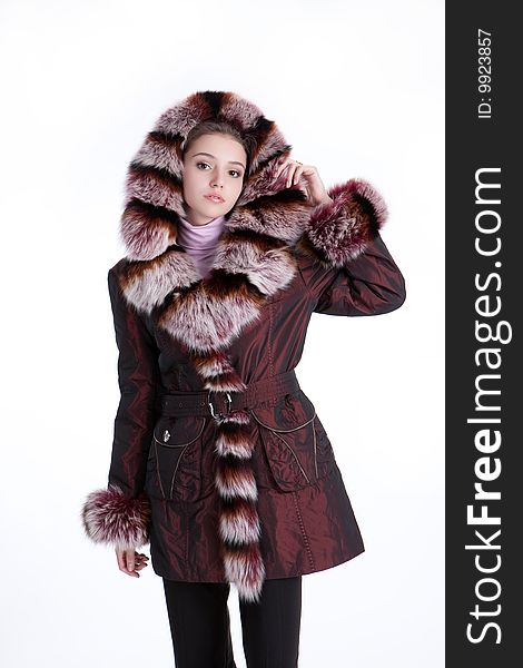 Young woman wearing jacket with fur. Young woman wearing jacket with fur