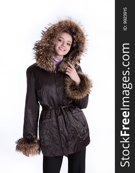 Young woman wearing jacket with fur. Young woman wearing jacket with fur