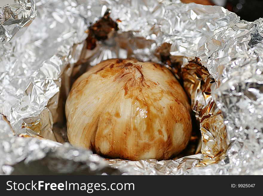 Baked garlic in a foil with  Olive oil