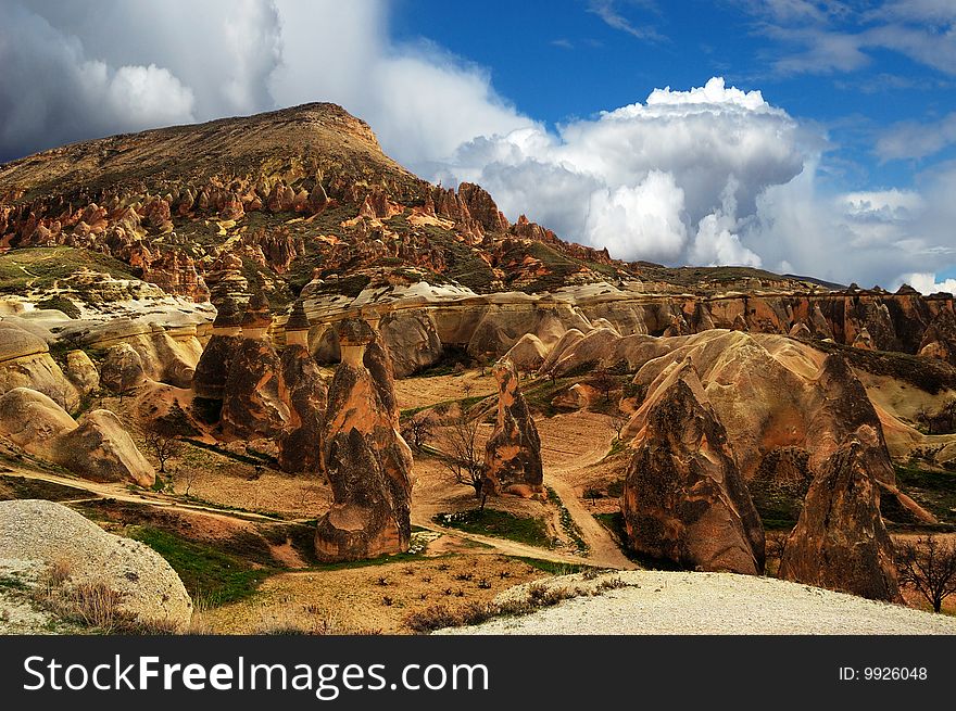 Clouds and shapes of weathering in Cappadocia, Turkey.