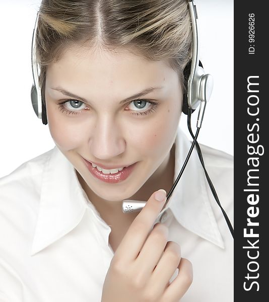 A friendly secretary/telephone operator in an office environment.