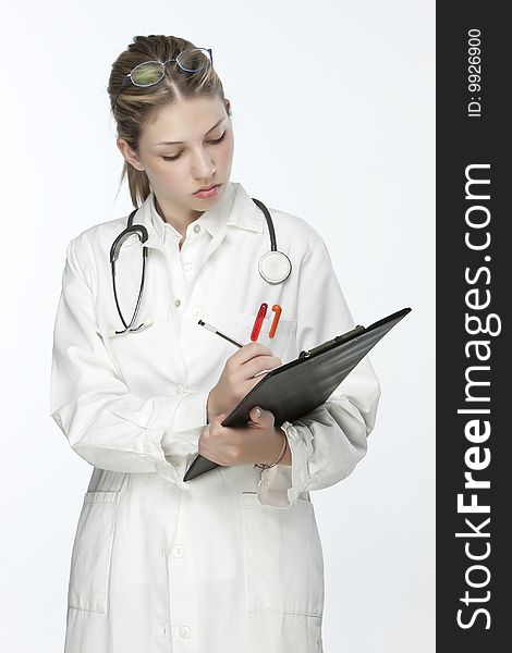 Beautiful young doctor with stethoscope