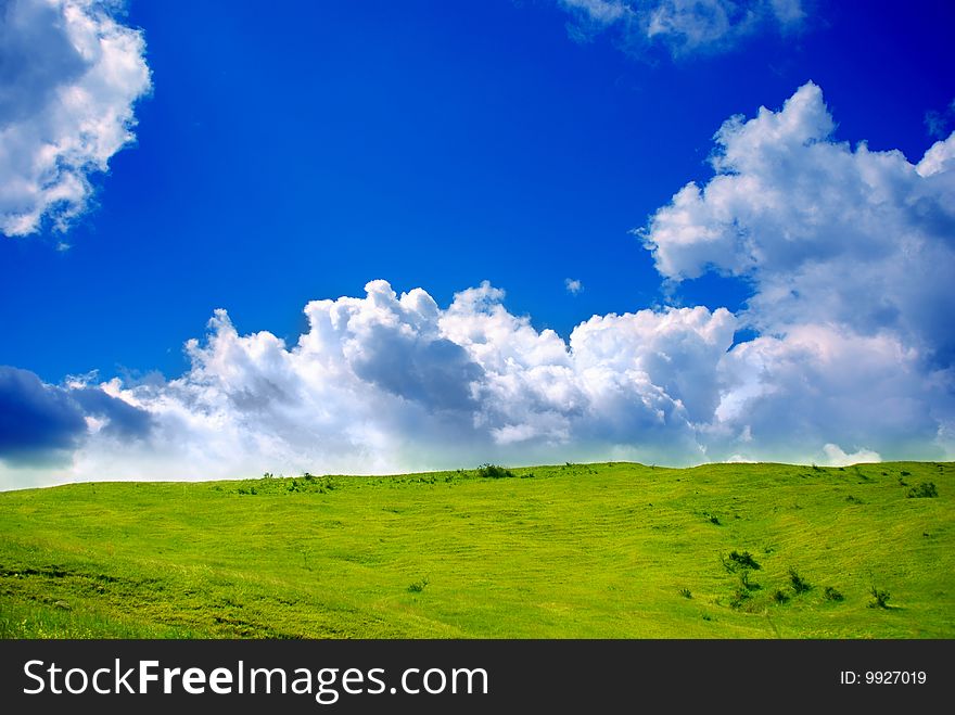 Green grassland and clouds, beautiful landscape