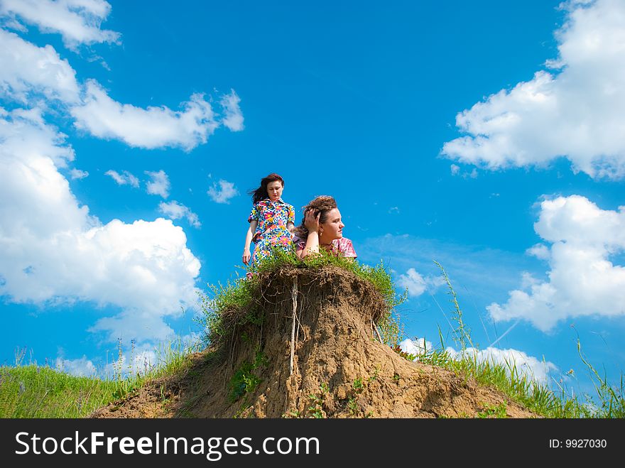 Two girls on a hill. Two girls on a hill