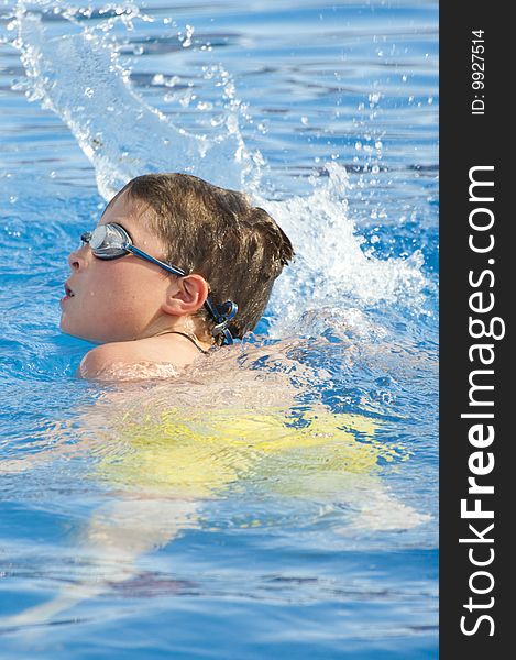 Picture of a boy on a swimming pool