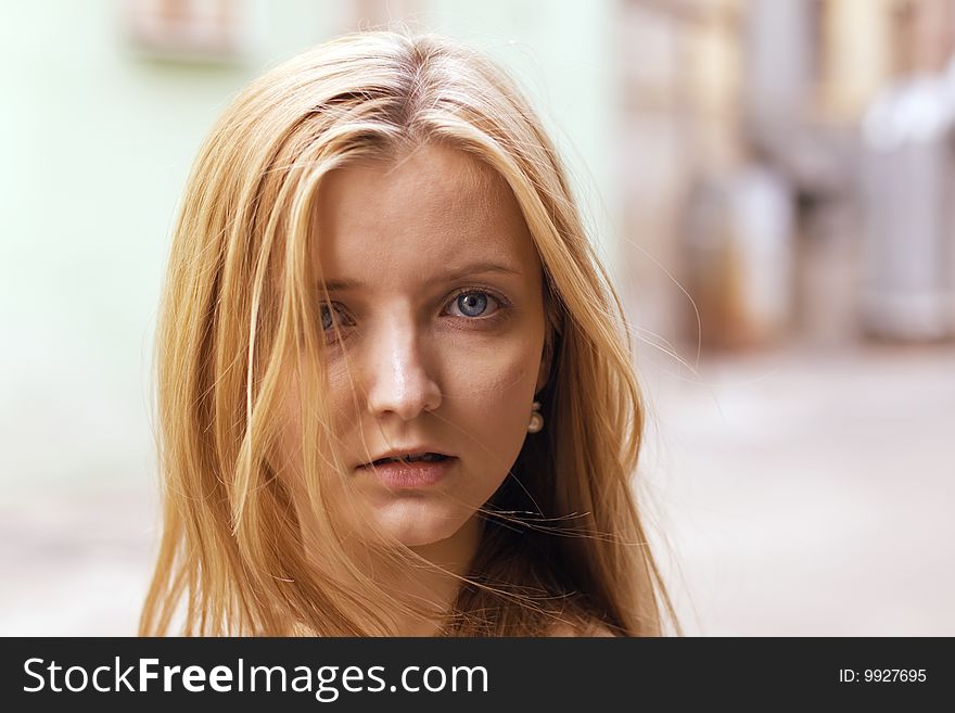 Portrait on young woman in the street