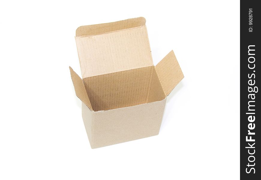An open cardboard box isolated white backround. An open cardboard box isolated white backround