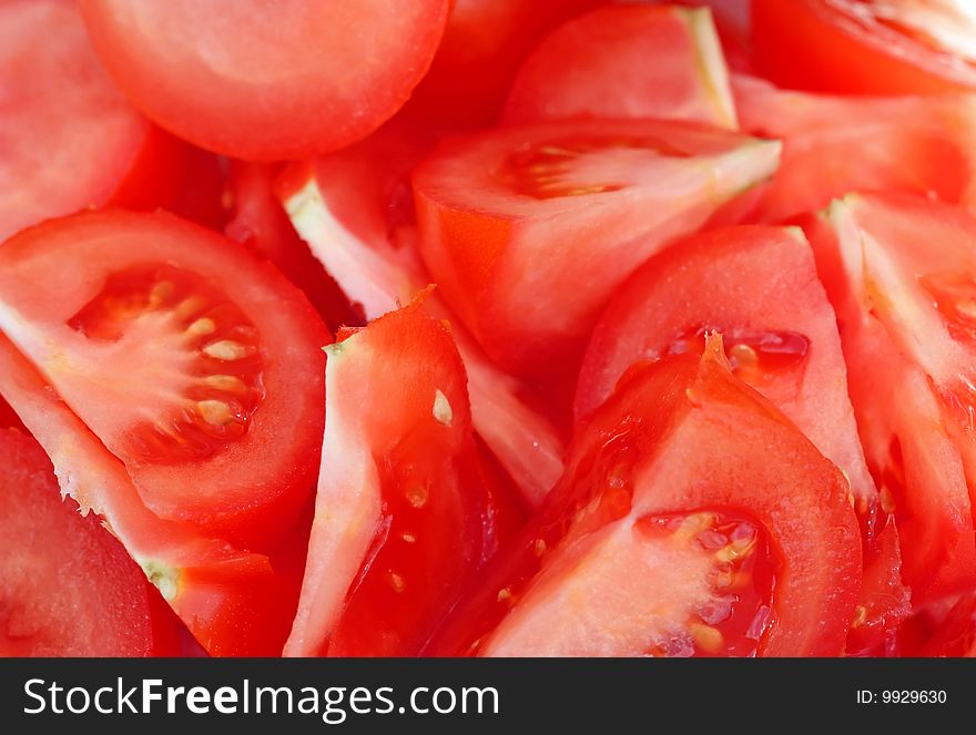 Fresh natural tomato slice to background