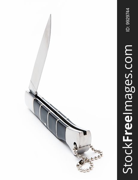 Sharp folding knife with a metal chain