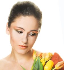 Woman With Tulips Stock Photos