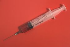 Syringe On Red Royalty Free Stock Images Syringe On Red Royalty Free Stock Images