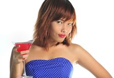Young Asian Woman Holding A Glass Of Cocktail Stock Photography Young Asian Woman Holding A Glass Of Cocktail Stock Photography