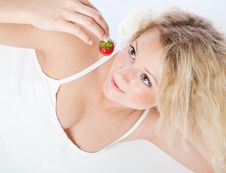 Young Woman In White Dress Eating Strawberries Stock Photos Young Woman In White Dress Eating Strawberries Stock Photos
