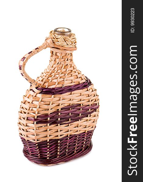 Wicker bottle on white background