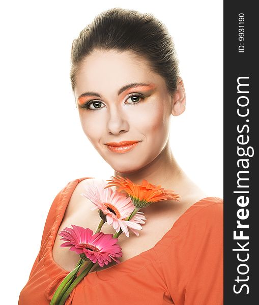 Young woman in orange shirt with bouquet. Young woman in orange shirt with bouquet