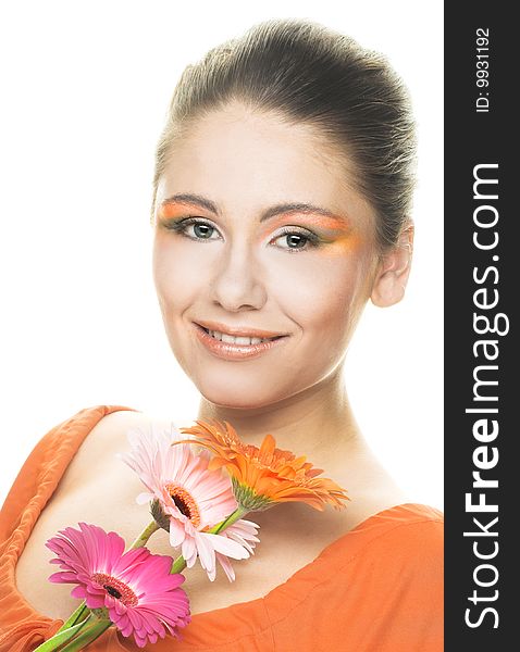Young woman in orange shirt with bouquet. Young woman in orange shirt with bouquet