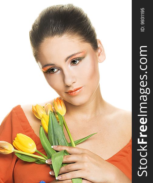 Portrait of young woman with yellow tulips. Portrait of young woman with yellow tulips