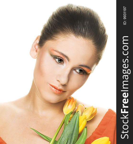 Portrait of young woman with yellow tulips. Portrait of young woman with yellow tulips