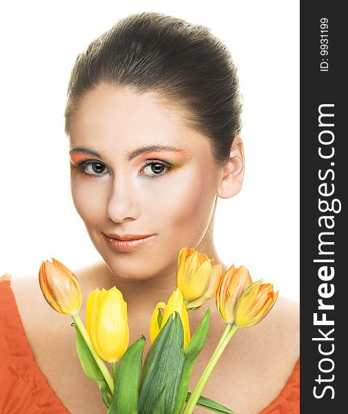 Portrait of young woman with yellow tulips. Portrait of young woman with yellow tulips