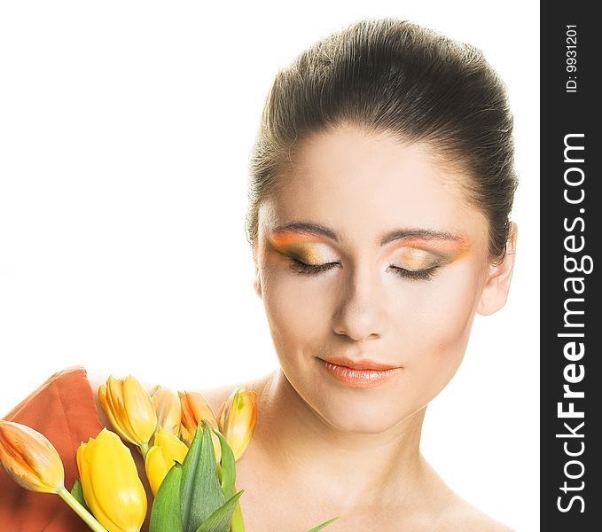 Portrait of young woman with yellow tulips. Portrait of young woman with yellow tulips