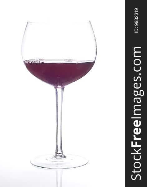 Glass of red beverage or wine