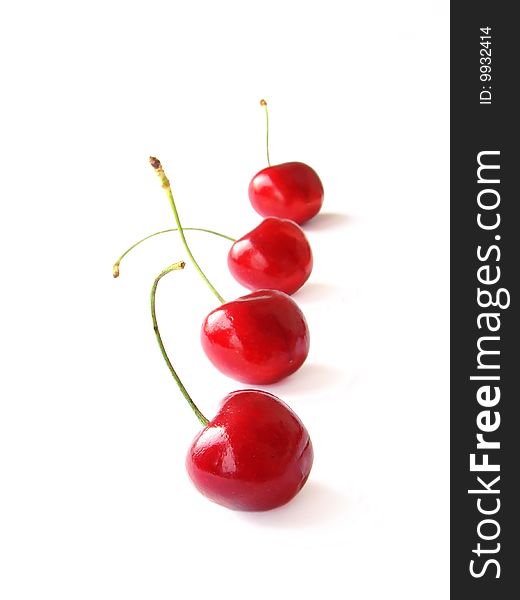 The Fresh sweet cherry on a white background