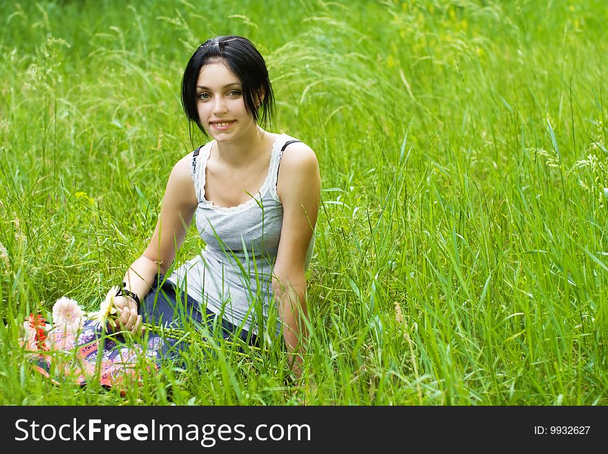 Portrait of beauty girl on meadow