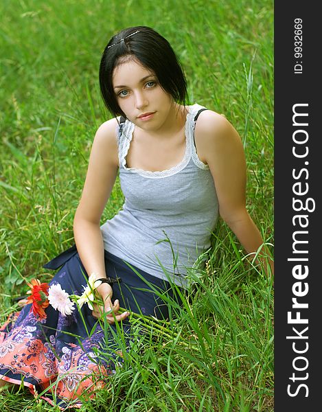 Portrait of beauty girl on meadow