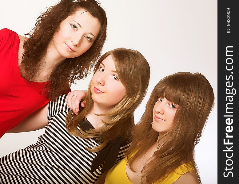 Portrait of three smiling attractive girlfriends. Portrait of three smiling attractive girlfriends