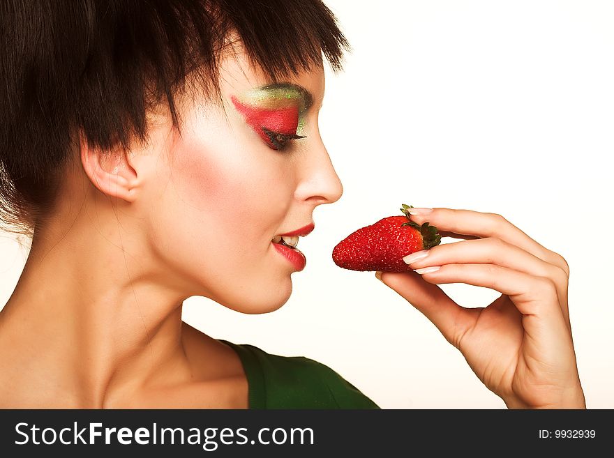 Beautyfull smiling girl with strawberry