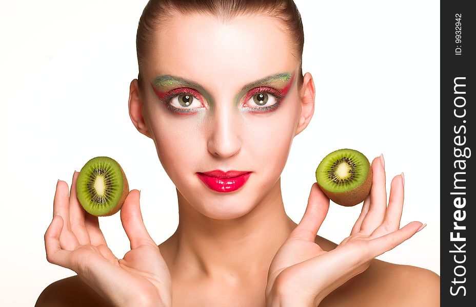 Beautiful woman`s face with kiwi. Beautiful woman`s face with kiwi