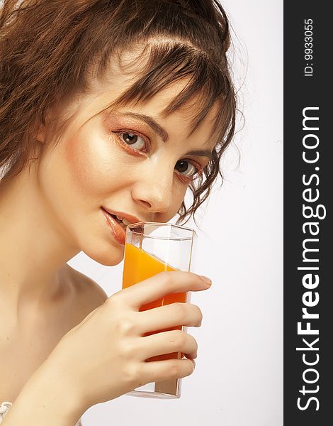 Young beautiful woman with orange juice