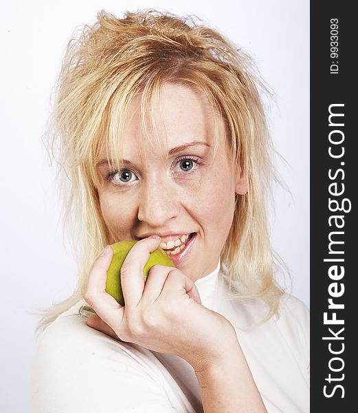 Woman with apple isolated over white background