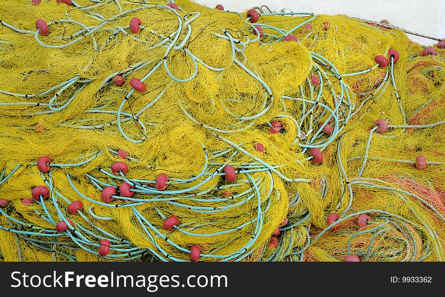 Fishing utilities: yellow trawl net. Fishing utilities: yellow trawl net