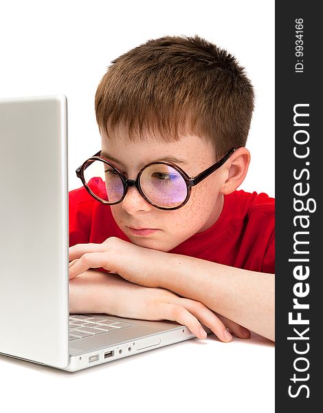 Boy with a laptop on a white background