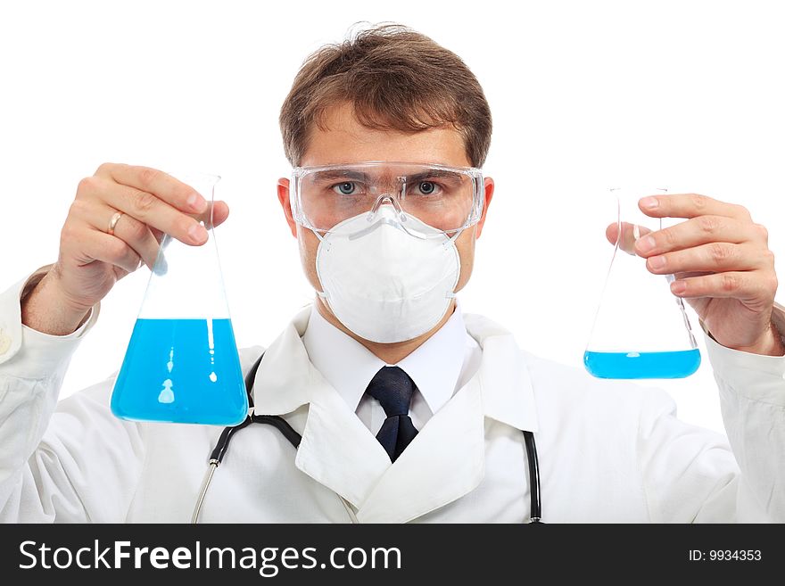 Medical theme: serious doctor working in a laboratory. Medical theme: serious doctor working in a laboratory.