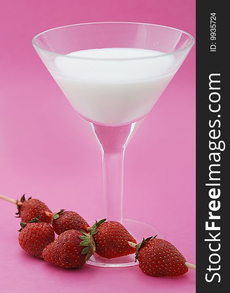 A Cocktail Is Creamy With A Strawberry