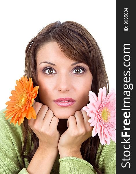 Close-up of beautiful woman with flower, studio shot