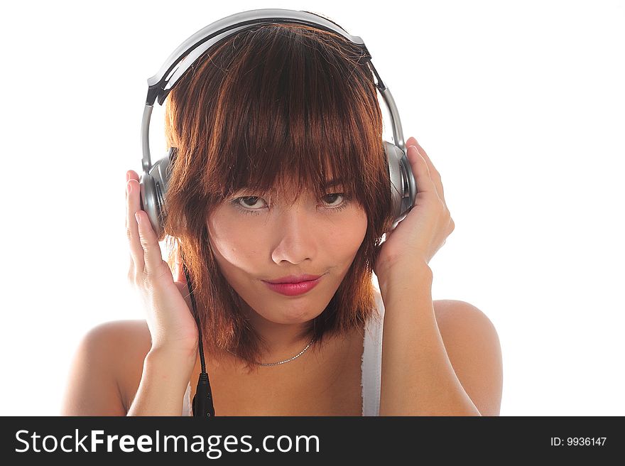 Very seductive young asian woman listening  music with headphone. Very seductive young asian woman listening  music with headphone