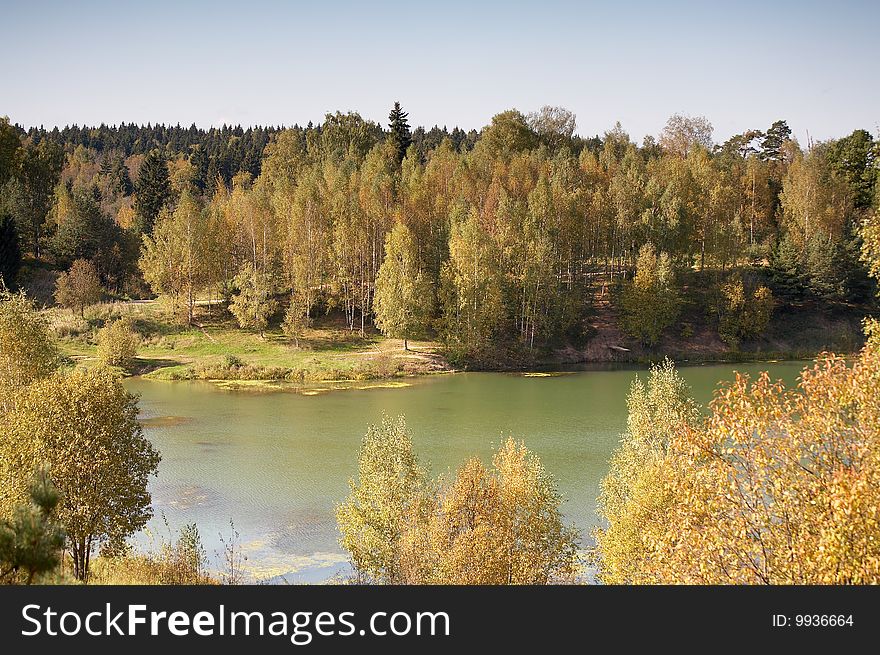 Little forest river in autumn, Russia