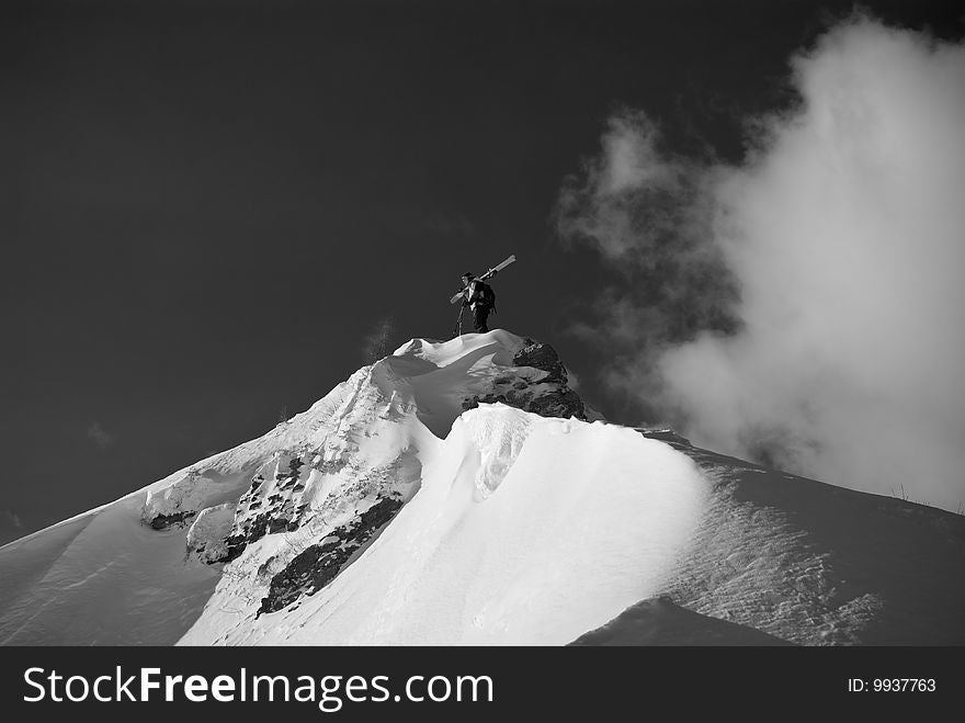 Skier alone on the peak. Skier alone on the peak