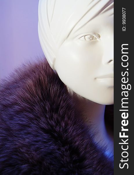 Purple fur collar on a dummy