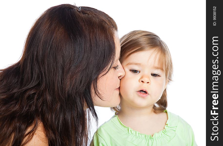 Mother and her little daughter. Isolated on white background