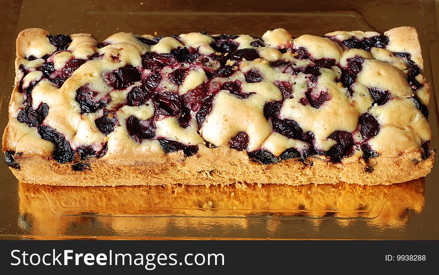 A delicious cake with cherry. A delicious cake with cherry